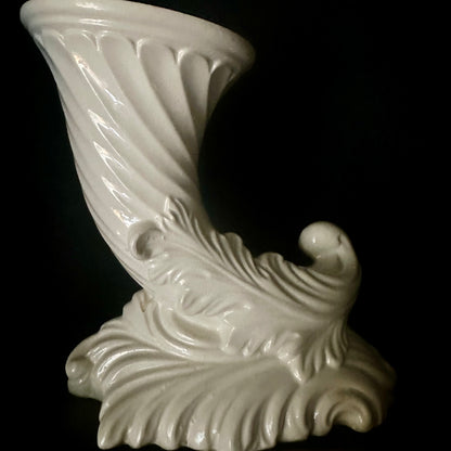 Small cornucopia vase Sat on cresting wave