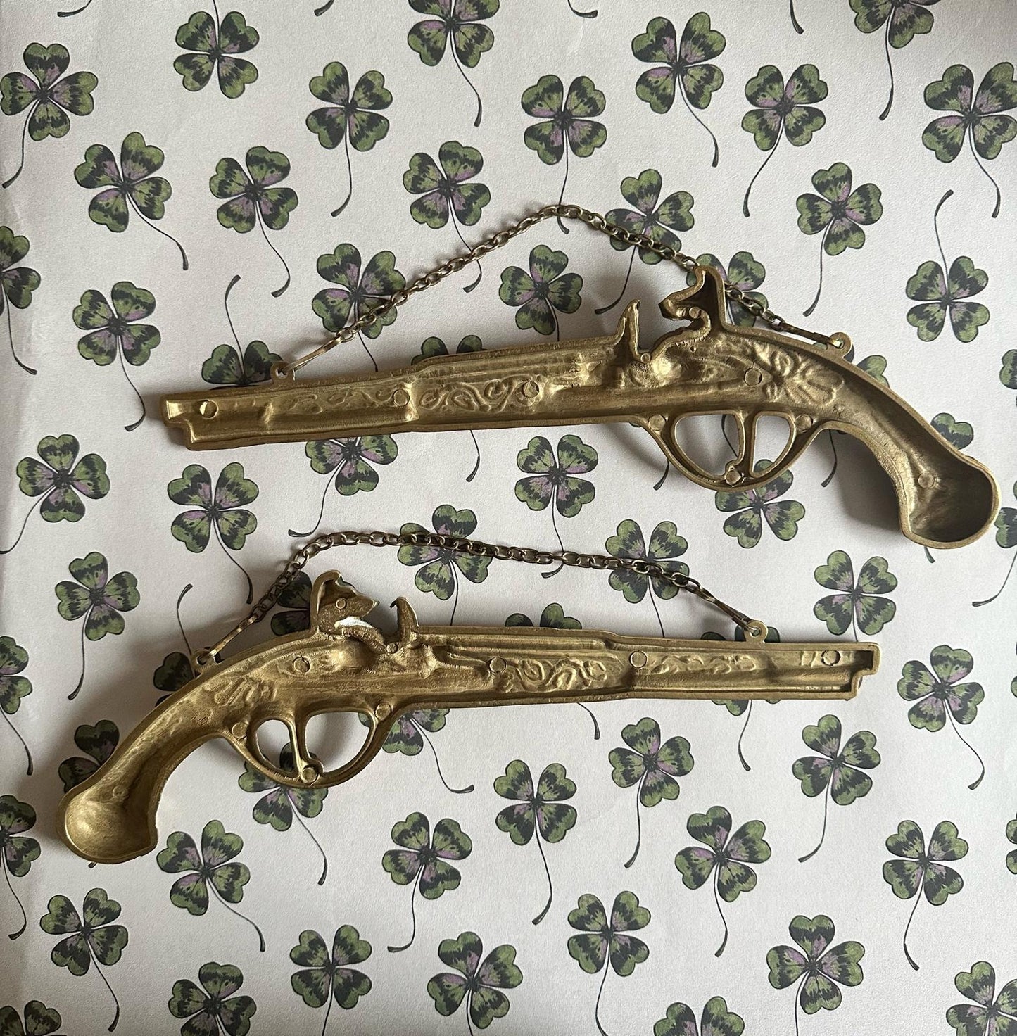 A cool Pair of Brass Pistol (with hanging chain) - FLORA BLACK